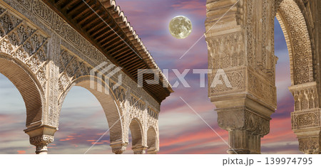 Arches in Islamic (Moorish) style (against the sunset) in Alhambra, Granada, Spain 139974795