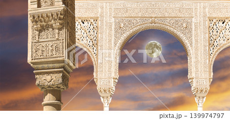Arches in Islamic (Moorish) style (against the sunset) in Alhambra, Granada, Spain 139974797