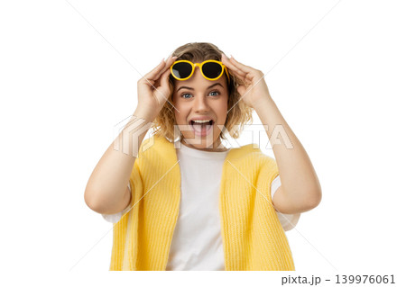 Woman with curly hair smiles and holds sunglasses up, PNG Woman with curly hair smiles and holds sunglasses up, PNG 139976061