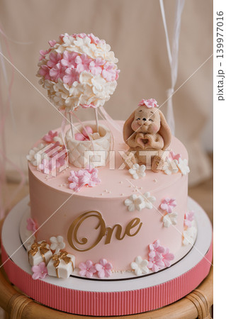 Pink First Birthday Cake with Teddy Bear and Hot Air Balloon Flower Decoration Pink First Birthday Cake with Teddy Bear and Hot Air Balloon Flower Decoration 139977016