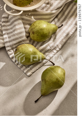 Fresh Green Pears with Sunny Shadows. Top View Fresh Green Pears with Sunny Shadows. Top View 139979767