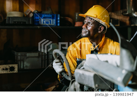 Professional young Black male worker looking away, Emotion proud success and dream to the future Professional young Black male worker looking away, Emotion proud success and dream to the future 139981947