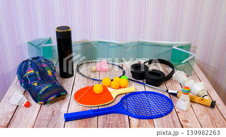 badminton and table tennis set with accessories on table badminton and table tennis set with accessories on table 139982263