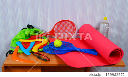 racket, boomerang, ball, mat, backpack, glasses, bottle, sports, equipment, fitness racket, boomerang, ball, mat, backpack, glasses, bottle, sports, equipment, fitness 139982271