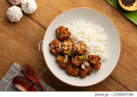 Fried Pork Balls(minced pork) with Garlic and Pepper and cooked rice Fried Pork Balls(minced pork) with Garlic and Pepper and cooked rice 139984596