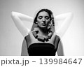 Woman double exposure portrait with abstract geometric necklace 139984647