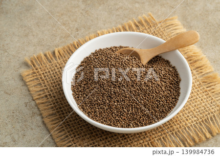roasted perilla seed in white plate. roasted perilla seed in white plate. 139984736