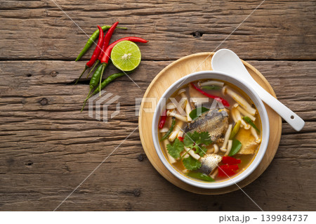 Tom Yam canned mackerel fish in tomato sauce with Shimeji mushroom. 139984737