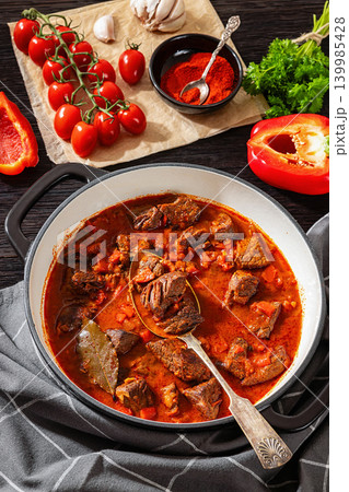 Beef goulash stew with paprika in ceramic pot Beef goulash stew with paprika in ceramic pot 139985428