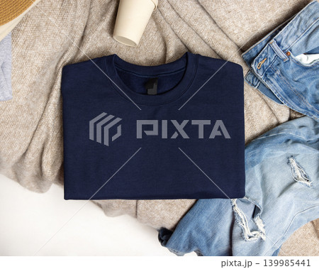 Blank dark blue unisex sweatshirt mockup, folded crewneck casual flat lay with copy space on front 139985441