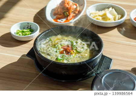 Traditional Jeju Pork and Seaweed Soup Momguk in Earthenware Pot Traditional Jeju Pork and Seaweed Soup Momguk in Earthenware Pot 139986564