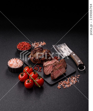 Beef mignon steak, rare, meat grilled with salt and spices. Beef steak Beef mignon steak, rare, meat grilled with salt and spices. Beef steak 139986764