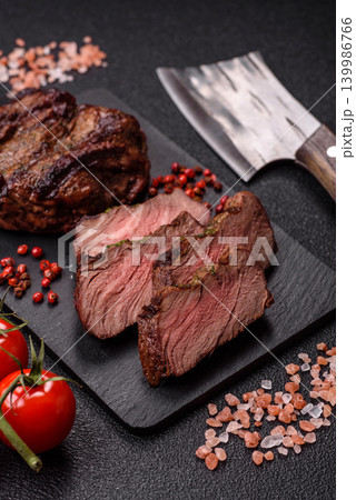 Beef mignon steak, rare, meat grilled with salt and spices. Beef steak Beef mignon steak, rare, meat grilled with salt and spices. Beef steak 139986766