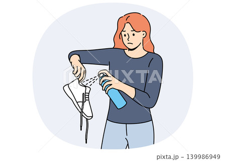 Woman shoes have bad odor and require use of antibacterial gel to get rid of stench 139986949