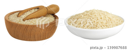 rice basmati in a wooden and ceramic bowl isolated on white background rice basmati in a wooden and ceramic bowl isolated on white background 139987688