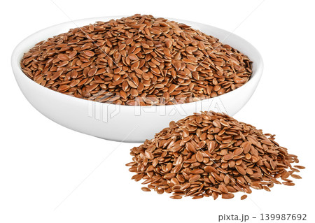 flaxseed in ceramic bowl isolated on white background. Top view. Flat lay 139987692