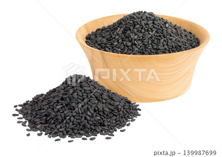 black sesame seeds in wooden bowl isolated on white background with full depth of field black sesame seeds in wooden bowl isolated on white background with full depth of field 139987699