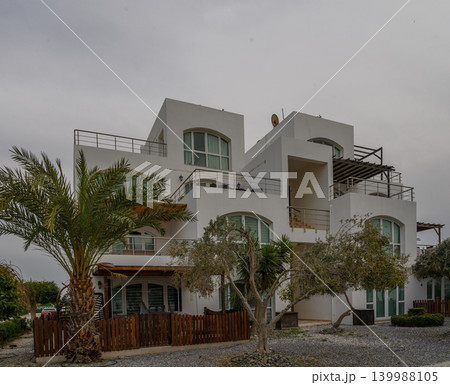 Modern architecture blends with nature in serene coastal retreat near the beach 139988105