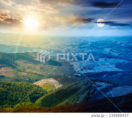 mountainous countryside scenery. day meet night. view of epic sky above the valley. sun and moon in harmony over colorful meadows and trees on hill. beautiful nature scenery of carpathians mountainous countryside scenery. day meet night. view of epic sky above the valley. sun and moon in harmony over colorful meadows and trees on hill. beautiful nature scenery of carpathians 139988437