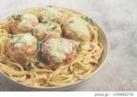 spaghetti with chicken meatballs, with cream sauce, and parmesan cheese, and decorated with microgreens, homemade, no people, 139988734