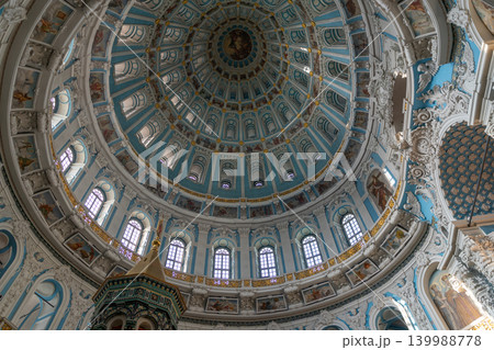 Ornate Blue Baroque Cathedral Dome Interior With Decorative Frescoes and Gold Accents 139988778