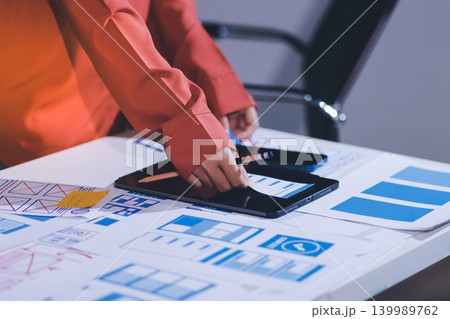 team of UI UX web designer are working together to develop mobile responsive websites with UI UX front end designer previews team of UI UX web designer are working together to develop mobile responsive websites with UI UX front end designer previews 139989762