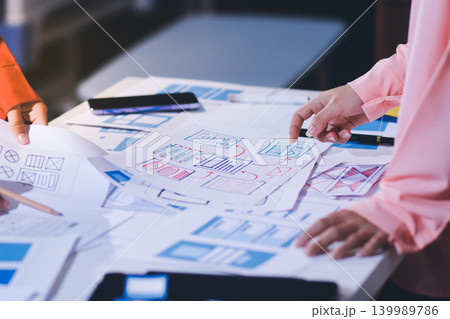 team of UI UX web designer are working together to develop mobile responsive websites with UI UX front end designer previews team of UI UX web designer are working together to develop mobile responsive websites with UI UX front end designer previews 139989786