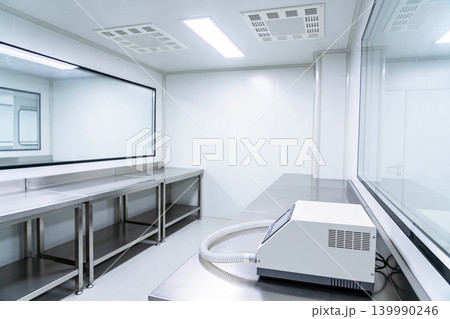 Modern sterile laboratory cleanroom with stainless steel benches and equipment Modern sterile laboratory cleanroom with stainless steel benches and equipment 139990246