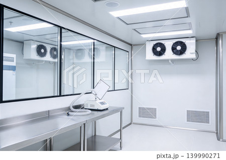 Cleanroom laboratory with stainless steel table and scientific equipment Cleanroom laboratory with stainless steel table and scientific equipment 139990271