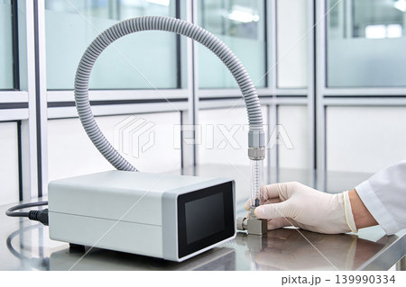 Laboratory equipment with flow meter and digital display in cleanroom setting Laboratory equipment with flow meter and digital display in cleanroom setting 139990334