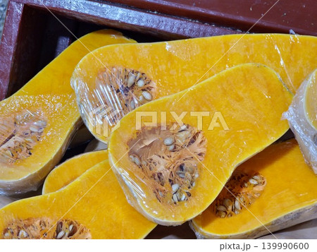Close up of cut butternut squash with seeds 139990600