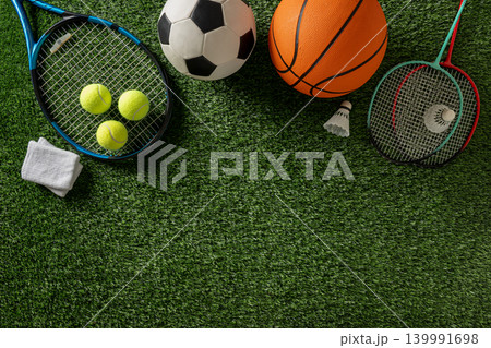 Sports equipment on green grass background with copy space 139991698