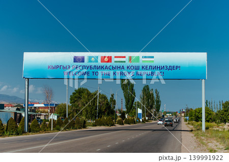 Poster on the highway during the international summit in Kyrgyzstan Poster on the highway during the international summit in Kyrgyzstan 139991922