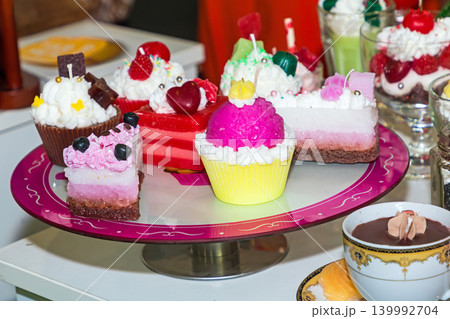 Cakes on a plate in cafe Cakes on a plate in cafe 139992704