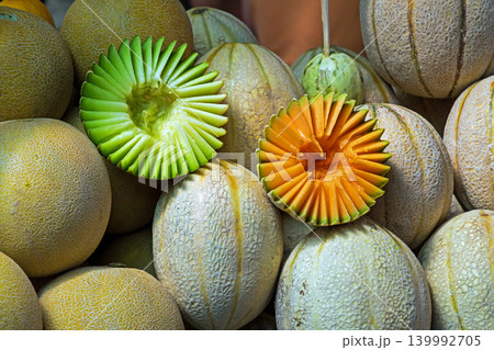 Carved melon sold on market Carved melon sold on market 139992705