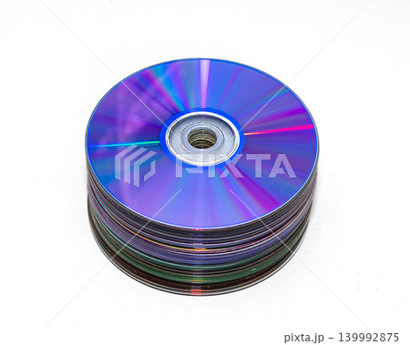 Pile of purple shiny compact discs 139992875