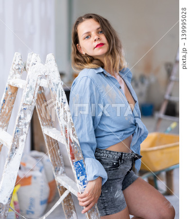 Sexy woman posing in building site 139995028
