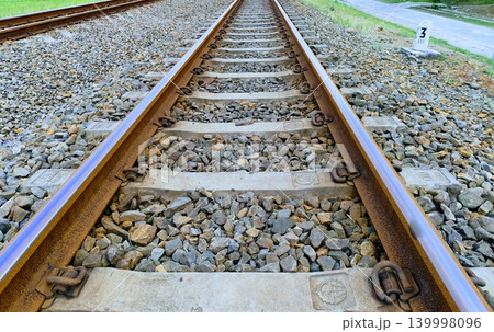 photo of railroad tracks with gravel rocks photo of railroad tracks with gravel rocks 139998096