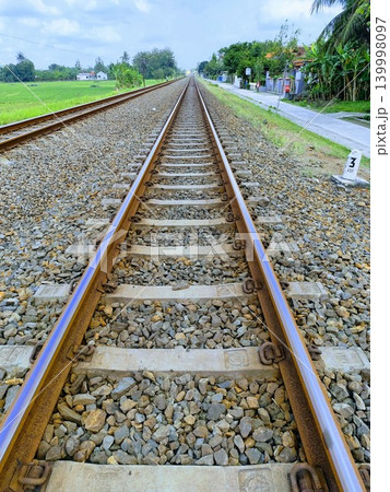 photo of railroad tracks with gravel rocks photo of railroad tracks with gravel rocks 139998097