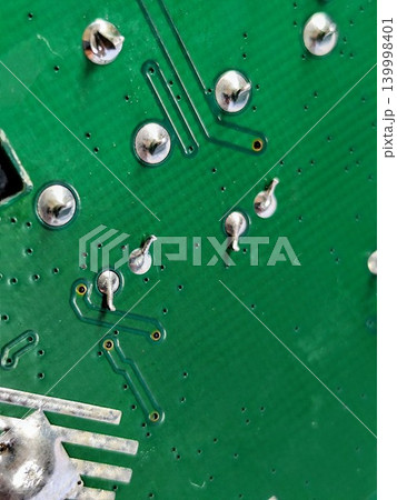photo of a broken electronic circuit board 139998401