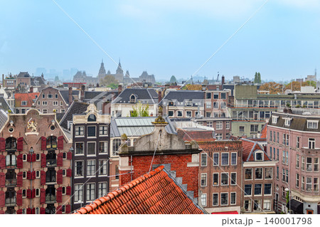View of the rooftops and buildings of Amsterdam, the capital of the Netherlands View of the rooftops and buildings of Amsterdam, the capital of the Netherlands 140001798