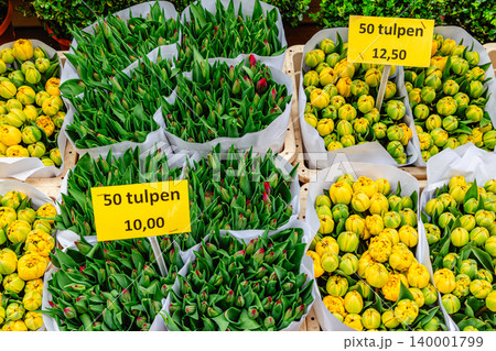 Colorful tulips for sale at a vibrant market. Colorful tulips for sale at a vibrant market. 140001799