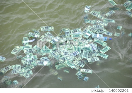 American Dollars in a water 140002201