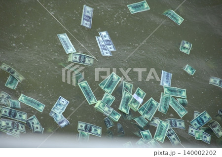 American Dollars in a water 140002202