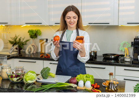 Middle-aged woman checking healthy grocery list on smartphone in home kitchen for diet meal planning Middle-aged woman checking healthy grocery list on smartphone in home kitchen for diet meal planning 140002399