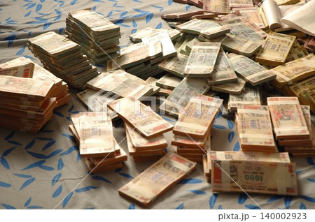 Indian Currency on Bed Indian Currency on Bed 140002923