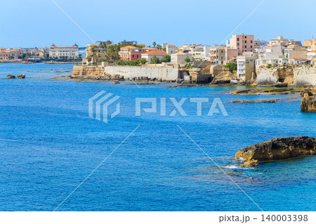 Ancient Greek city waterfront district with marble houses overlooking the blue sea Ancient Greek city waterfront district with marble houses overlooking the blue sea 140003398