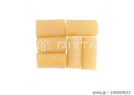 raw rigatoni pasta isolated raw rigatoni pasta isolated 140004631
