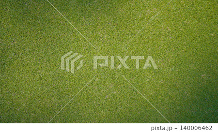 Green grass background, top view background of garden bright grass concept used for making green backdrop. Green grass background, top view background of garden bright grass concept used for making green backdrop. 140006462