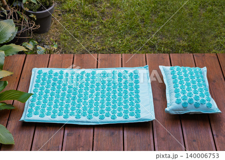Blue Acupressure Mat Set on Garden Terrace Blue Acupressure Mat Set on Garden Terrace 140006753